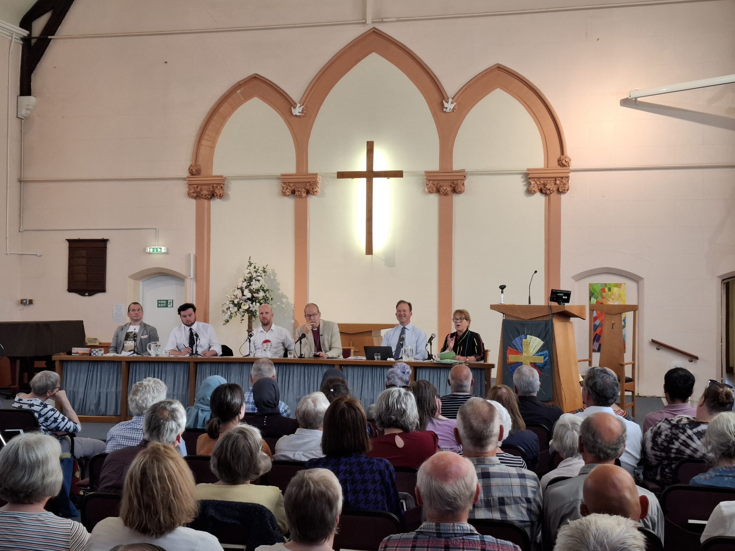 Hustings held in a church, panel and audience