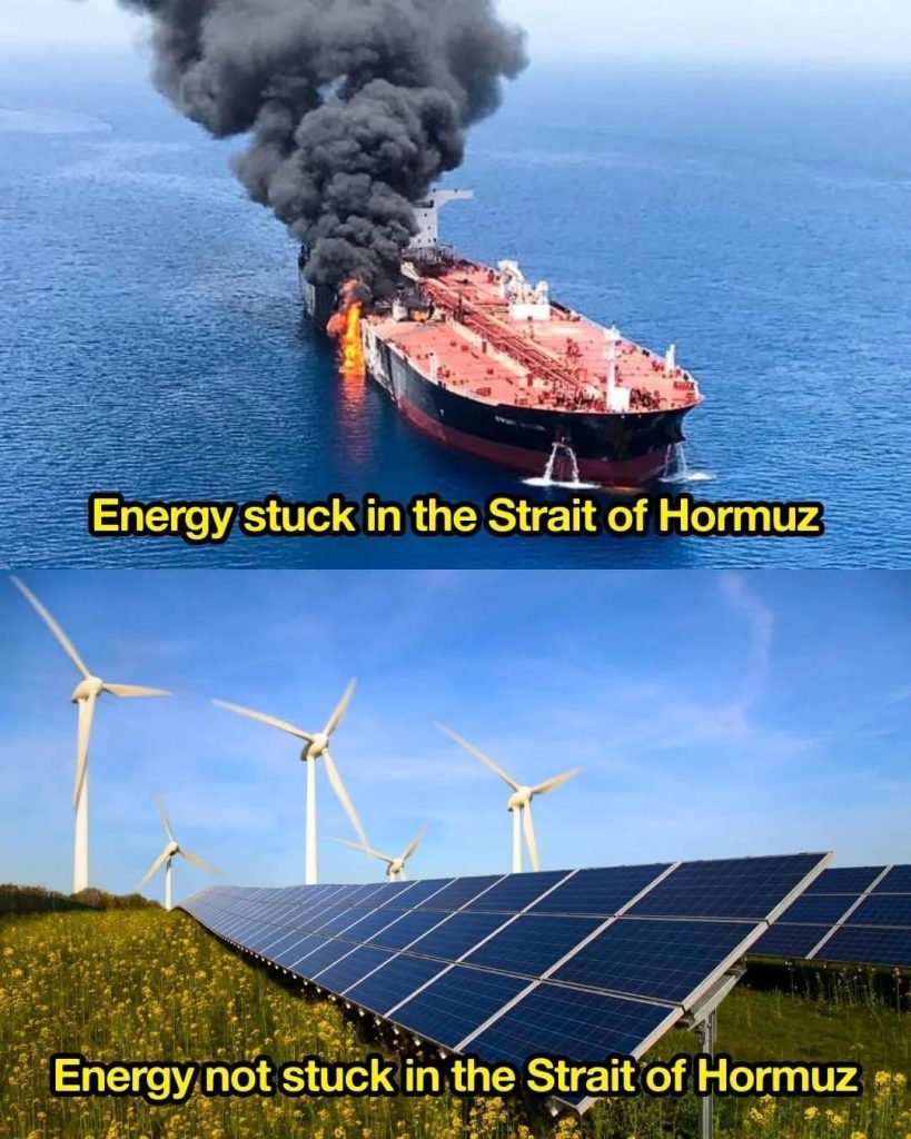 A meme format split into two halves. The top half - a ship on fire in water, caption 'Energy stuck in the Strait of Hormuz'. The bottom half - wind turbines and solar panels, caption 'Energy not stuck in the Strait of Hormuz'.